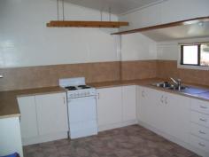 87 James St, Mount Morgan QLD 4714 $185,000 PROPERTY FEATURES: – Huge High-Set Family Home – 4 Double Size Bedrooms – Huge Sunroom – Large Lounge Area – Great Sized Kitchen – Entertainment Area at rear – Double Carport – Lock-up Garage/storage shed – 855m2 Corner Block with rear street access – Short walk to Schools and Shops – Picture Theatre & Pub Close By – Recent exterior paint