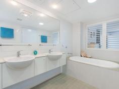 16 / 146 Prince Edward Parade, Scarborough - Waterfront Properties Redcliffe Right on the Bay! There are just so many features to enjoy if you move into 'The Bay' complex at Scarborough - which is described by residents as a "Happy building". Not only is Unit 16 a very spacious (199m2) three bedroom apartment, but its design is practical and well thought out. With views that cannot be built out you will always be able to enjoy the gorgeous Bay outlook plus the delightful pretty night lights of both Redcliffe and all the way back to the Port of Brisbane. It's important for buyers to know that any new home built on the visible vacant block has a height restriction - the same level as the ones either side, so you will always have a water view. The very large Master bedroom opens up to the balcony facing the Queens Beach, so you can fall to sleep listening to the water lapping at the foreshore. Both ensuite and spare bathroom are bigger than most and the apartment has tons of storage cupboards throughout. Superbly located approximately halfway between Redcliffe and Scarborough, you can walk out the door and decide which way you fancy wandering off for your morning walk! It's such a desirable lifestyle choice with happy residents who enjoy an living in an attractive, well-serviced building. The lovely foyer features a gorgeous pool, spa, gym and large common area. Even the secure basement carpark is well-serviced, with a bathroom (ideal if you are downstairs in your garage area),a car wash station along with direct access to the beachfront via a tunnel walkway (meaning you can wheel a kayak or bikes from your garage through to the waterfront). Fully enclosed double garages are rare in unit complexes and this one is certainly bigger than average with plenty of storage room - perfect for those down-sizing from larger family homes who still want somewhere to 'potter or tinker'. As there is no road in front of this unit, there is minimal (if any) traffic noise either! This lovely apartment is well worth an inspection, so it should definitely be on your list of apartments to view! This unit features: • Spacious 199m2 of living • Three good-sized bedrooms • Study nook • Large bathrooms • Separate laundry • Two separate balconies • Water views from your kitchen, living area and front balcony • Plantation shutters throughout • Freshly re-painted internally • Access to pool, spa, gym roof-top • Great location with direct access to walking paths and the beach • Large double lock-up garage in secure basement carpark • NBN ready You need to make an appointment to view this apartment to appreciate all of the above, so call Karen Prince now on 0437 015 951 to arrange a time!