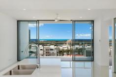 904/9-11 'Bay Grand Apartments' Enid Street Tweed Heads NSW 2485 $650K - $690K From the moment you open the door of your brand new apartment, you will be spell bound by the majestic 180 degree views of the Tweed River, Seaway & the Pacific Ocean, including Cook Island. This sleek & crisp (2) bedroom apartment is located on the top floor (9th level) and offers secure & comfortable living with a myriad of lifestyle conveniences at your finger-tips. KEY FEATURES: - Open plan tiled living & dining - Stylish kitchen w dishwasher & gas cooktop - Master bedroom w ensuite & balcony access / amazing sea views - Generous terrace style balcony to relax & enjoy the views - Secure basement parking - Pet friendly ADDITIONAL FEATURES: - Ducted air-conditioning - Ceiling fans - Resort style lap pool & gym facilities - BBQ facilities DETAILS: Body Corporate - $70 approx. per week Rates - $TBA Market Rent - $525-$550 per week Holiday Market weekly tariffs - (please refer to www.goldcoastholidayhomes.com.au for letting & management advice) LOCATION: This brand new apartment is extremely well positioned on the cusp of Coolangatta CBD & Tweed central. Therefore, you can leave your car at home and stroll to a smorgasbord of cafes, with major shopping at the end of the street. In addition, you are walking distance to the Tweed Hospital, Bowls Club and local beaches at Coolangatta & Rainbow, which are so close you can smell the salt in the air! AGENT'S COMMENTS: A brand new abode, super convenient and ready to welcome its first resident, lucky you! Nothing to do but move in and enjoy, it's quite possible you will never want to leave'.