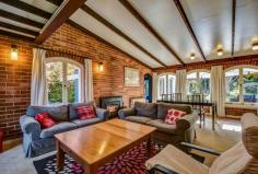 13 Old Wingello Rd Bundanoon NSW 2578 $680,000 - $720,000 A solid home offering something different. The painted brick and tile home has a Spanish flair with arched timber casement windows a feature of the property ensuring a garden vista from every room. Living areas all offer a perfect northern aspect with raked ceilings a feature of the grand living / dining space. Entry hall offers a good space easily converted to a home office if needed A new, modern centrally located kitchen with new appliances is the hub of the home with the perfect built in window seat for your morning coffee The sunroom is also currently used as a possible 4th bedroom / guest room and would make a perfect artist studio overlooking the splashes of colour in the rear yard All bedrooms have built in robes with the master accommodating a large walk in and direct access to the combined ensuite / laundry room There is a new S/C fire and numerous split systems for cooling and heating throughout Single garage with workshop space, garden shed and utilities shed at rear A private, terraced area off the living and kitchen offers another space to entertain and enjoy the stunning established gardens. A lovely mix of deciduous trees, shrubs and roses in this well fenced and privately positioned home. Brilliant location within this gorgeous village and an easy stroll to everything.