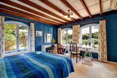13 Old Wingello Rd Bundanoon NSW 2578 $680,000 - $720,000 A solid home offering something different. The painted brick and tile home has a Spanish flair with arched timber casement windows a feature of the property ensuring a garden vista from every room. Living areas all offer a perfect northern aspect with raked ceilings a feature of the grand living / dining space. Entry hall offers a good space easily converted to a home office if needed A new, modern centrally located kitchen with new appliances is the hub of the home with the perfect built in window seat for your morning coffee The sunroom is also currently used as a possible 4th bedroom / guest room and would make a perfect artist studio overlooking the splashes of colour in the rear yard All bedrooms have built in robes with the master accommodating a large walk in and direct access to the combined ensuite / laundry room There is a new S/C fire and numerous split systems for cooling and heating throughout Single garage with workshop space, garden shed and utilities shed at rear A private, terraced area off the living and kitchen offers another space to entertain and enjoy the stunning established gardens. A lovely mix of deciduous trees, shrubs and roses in this well fenced and privately positioned home. Brilliant location within this gorgeous village and an easy stroll to everything.