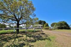 1144 Kingsvale Road Young NSW 2594 $389,000 A wonderful, homely lifestyle property on acreage in an affordable price range. And it's less than 5km from town. Lovingly owned by the current vendor for the past 30 years, the time has come to move on. With subdivision potential to boot, you best be quick with this one! The Land 16.1 acre parcel with beautiful views across local orchards and back towards the township of Young. Importantly, it is zoned Large Lot Residential (R5), making it sub-dividable down to 1 hectare allotments (subject to council approval & infrastructure). The topography is moderately undulating, encompassing 180 degree postcard scenes with scattered trees & two dams. The House 1950's weatherboard of approx. 155m2 living. Recently freshened up', this three bedroom home has warmth & charm of the mid 20th century coupled with mod cons. Original features include polished timber floors, 10ft ceilings & fireplace. The home comprises of a separate lounge & dining room with wood heater & wall AC, timber kitchen with walk-in pantry, foyer and further potential to improve. Miscellaneous & Facilities Upon the block you will find a tandem garage space with substantial old timber workshop. There are 3x 22,000L water tanks that service the property. The property has impressive animal facilities to house dogs, birds and various types of livestock. Do not miss out on this one! To arrange an inspection, contact exclusive selling agent, Adam Strong on 0438 825 800. Please Note: Whilst all care has been taken by Ray White Young to ensure accuracy in preparation of the particulars herein, no warranty or representation, express or implied, as to the accuracy or completeness of the particulars provided is made or given by us and interested parties must therefore rely on their own enquiries. Liability for any error, omission, negligence or misrepresentation is hereby excluded. FEATURES: Air Conditioning Fireplace(S)...