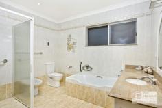 83 Lanhams Road Winston Hills NSW 2153 Situated in one of Winston Hills best locations and offered for the first time in 45 years is this full brick residence with sweeping 180 degree views. Sprawled over three levels and resting on approx. 607sqm, the flexible floorplan provides an exciting opportunity for the growing family, a home base business, or in-law accommodation. The oversized windows and multiple skylights provide an exceptional amount of natural light together with the generous open plan living and dining extending to the large entertaining balcony that soaks in the serene view. All the elements are here to make this great property even greater. All within strolling distance to Winston Hills Mall, local schools and transport. Other high points: - An ideal north east aspect providing natural light all year round - Solid timber kitchen and ample storage throughout the home - Three generous sized bedrooms plus study (or fourth bedroom) located on the upper level all with built-ins and master bedroom with ensuite - A further three bedrooms and bar area located on the lower level. - Internal access to the double lock up garage and laundry plus the home is equipped with a wine cellar - Ducted air-conditioning to upper level - Plenty of yard space to entertain friends and family - Moments to the area's excellent choice of schools..