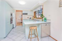 2 CRAIG PLACE GERRINGONG NSW 2534 $895,000 With a sunny northerly aspect and a view to the mountains, this welcoming 4 bedroom family home has plenty to offer. Making use of a spacious 850sqm block, the house has been cleverly positioned to take full advantage of the sun and the outlook while giving you space and privacy from your neighbours. Forget about donning the winter woolies - there are plenty of places to stay warm in winter with lovely sun-soaked bedrooms, living room and front porch. The living and dining rooms have been updated with beautiful bamboo flooring, and both the bathroom and ensuite have been newly renovated to a high standard. There is plenty of off-street parking with a double garage and large driveway plus ample space to park a caravan and boat with easy side access. The generous backyard has plenty of room for the kids and pets to play and includes a covered outdoor entertaining area, established veggie garden, and a shed to house the bikes, surfboards and other gear essential for enjoying the coastal lifestyle. Positioned on the corner of a quiet cul-de-sac street, this is a fantastic location to raise a family in walking distance to the beach and shops. It's an easy 700m stroll to beautiful Werri Beach, and there are playgrounds and sports fields in short walking distance too. This one won't last long, so get in quick - there is plenty of value to be found here!
