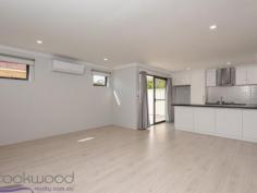 34 Dance Drive Middle Swan WA 6056 $319,000 A mere 6-months young, this modern, 3 bedroom, 2 bathroom rendered brick and iron home is waiting for you to turn the key and begin the adventure of life in a home of your own. Easy-care wood-look floors throughout, an open plan kitchen/meals/family and good-sized bedroom with built-in robes, fashion a home that feels bright, light and spacious. A reticulated front garden and small paved rear courtyard complete this ideal first home. 3 bedrooms 2 bathrooms 2019-built Ventura home Light neutral decor th’out Well-designed kitchen Open plan kitch/meals/fam Main bed ensuite & WI robe Secure remote entry garage Reticulated front gardens Level fully fenced 225 sqm Walk park school sports An open plan kitchen/meals/family sits at the heart of this home and offers a comfortable central living space. The kitchen features a 4-burner hob and oven, tiled splashback and ample overhead and under bench storage. An island bench with breakfast bar underlines the functional design while reverse cycle air conditioning keeps things comfortable year-round. Sliding doors opens to a small east-facing courtyard to create an ideal setting for indoor-outdoor living. The main bedroom features a walk-in robe and ensuite with large shower, vanity and W.C. and is arranged at the front of the property to create a sense of privacy. Two junior bedrooms are fitted with mirrored built-in robes and share the family bathroom. Built in 2019 by Ventura, this property offers first-home buyers a stylish easy-care home with a secure garage with direct access. Set within easy reach of the services and amenities of Midland and walking distance from schools, parks and sporting facilities, the decision to move in to a home of your own is easy...