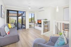 1/29 OLD SADDLEBACK ROAD KIAMA NSW 2533 $740,000 - $790,000 This spacious three bedroom Torrens Title/Strata Free townhouse is located in a small complex and enjoys ocean views from its large indoor/outdoor terrace. As you walk through you will fall in love with the spacious open plan living dining area with tiled floors and beautifully kitchen with stone benchtops flowing out to your totally private synthetic grassed courtyard. There is a second living area on the first floor which opens onto the huge covered indoor/outdoor terrace complete with sweeping views over Kiama and to the ocean and with bifold windows and shutters which ensures this space can be enjoyed all year round. There are three double size bedrooms ,the main bedroom features a walk-in robe and ensuite and opens out to the outdoor terrace. Two more generous bedrooms with built-ins and main bathroom featuring a beautiful spa bath. With security and peace of mind this property also has a large two car garage with automatic door and internal access. This gorgeous home is made feel very private behind the well established landscaped gardens, hedges and dry-stone wall. Quality features include; • 2 x Split System Air Conditioners • Gas heating • Dishwasher • Stainless steel appliances • Spa Bath • Bifold windows and shutters to the Covered Outdoor terrace • Private courtyard and established gardens. • Ceiling Fans