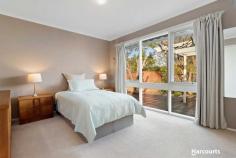 15 Koonalda Avenue Glen Waverley VIC 3150 This original vendors family home is the first time on the market and is ideally located in The Brentwood School Zoning, Glen Waverley South Primary School, and close to Buses, Station, Shopping centres and freeway access, what a position. Situated on a block of land 653m2 this immaculate home features: . 3 good size bedrooms, all with built in robes. . Formal lounge/dining with a gas log fire. . Family room with air conditioning. . Timber kitchen with excellent appliances and a meals area with a wood fire. . Main bathroom with a Spa bath and shower and vanity. . Plus a separate shower room. . Tandem garage with Auto door. . Paved out door entertaining areas and manicure gardens. This home is ready to move into and in prime condition.