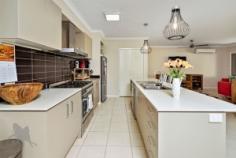 86A Old Gympie Road, KALLANGUR QLD 4503 | Madeleine Hicks Real Estate Brisbane Large Family All Level Living There is so much to love from the chef inspired kitchen, the abundance of space and the quality of fittings and fixtures seen throughout the home. This home makes for great entertaining both inside and out with the kitchen in the hub of the home overlooking the living and outdoor entertaining area. Located in the heart of Kallangur and a short distance to local schools, shops and transport. Be sure to make this home the top of your inspection list. You will love: – Multiple living spaces – Air conditioning in the main living area – Master bedroom with ensuite and walk in wardrobe – 3 bedrooms all with built in robes – Separate toilet from the main bathroom – Large laundry with extra storage – 4 large bedrooms with ceiling fans – Double lock up garage with internal access – Chef inspired kitchen with large island benchtop – 6 burner gas cooktop – Undercover entertaining area – Fully fenced yard – Low maintenance – Pets considered on application Contact the team to arrange your inspection AVAILABLE 8th October Bedrooms: 4 Bathrooms: 2