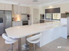 19 AURORA PLACE, Newport | Waterfront Properties Redcliffe RESORT STYLE LIVING IN NEWPORT – LARGE 700m CORNER BLOCK! This immaculately presented double story executive home, perfect for entertaining friends and family in the expansive outdoor entertaining area and sparkling in-ground pool. Featuring: • 5 generous sized bedrooms, master suite with ensuite, oversized shower + walk-in robe • Entertainer’s delight, gourmet kitchen with caesarstone benchtops, breakfast bar, ideal for the family and friends to gather • Media room featuring large screen, projector, along with a fully functional wet bar – you will love spending hours watching movies on the big screen • Multiple air-conditioned living areas, leading out to the expansive outdoor entertaining area and enjoy staying cool over Summer in the sparkling in-ground pool – complete with water feature • Upstairs features 4 bedrooms, including a spacious study nook in one of the bedrooms, along with an additional living area, ideal for kids looking for their own space, not to mention the deck overlooking the delightful pool and back yard • The upstairs is completed with a full-sized bathroom including separate bath and shower • Located downstairs is the 5th bedroom which could easily be utilised as a large office – perfect if working from home • Fully fenced, very private rear yard with meticulously maintained landscaped gardens, offering minimal maintenance • The double lock up garage offers remote control access, along with purpose built additional storage + option for further off-street parking Newport is synonymous with luxury and lifestyle. Trendy cafés, restaurants and boutique shops are nearby. Pristine beaches, leisurely strolls along the leafy foreshores, sailing, fishing, kayaking, paddling or just relaxing with friends at the local boat club overlooking the Marina. Newport is also located within the catchment zone for reputable schools, both private and public. Call today to arrange your inspection as this immaculately presented home will not be on the market for long!