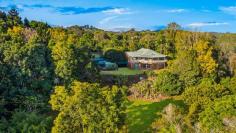 Alstonvale NSW 2477 Located in the ever green pocket of Willowbank Drive Alstonvale the story book setting is loved by many for the views, wildlife, creek and abundance of natural beauty (it's not hard to see why people seldom leave). Perched on an easy care 4.27 acres (over 100 metres above sea level) the home opens to breathtaking views of the rolling green hills over the established gardens and continues over the farmland and beyond making it feel like a million miles from anywhere. As you will discover the lush green setting is simply beautiful and the 2 story design and the unexpected spaces give plenty of scope for quality family living. Features include: - Spacious light filled living and dining areas flow out through sliding glass doors to deck and views - High vaulted ceilings balance with warm polished hardwood floors, loads of natural light - Expansive wrap around entertaining decks run the full length of the home, the perfect place to enjoy the country views and sunsets - 4 large built in bedrooms, master is ensuited and flows out to the deck - Tiled rumpus/games room on lower level perfect teenage retreat or extended living arrangement or potential to convert to a separate studio - Rolling green views, cool breezes & sunsets across the hinterland - Easy care 4.27 acres, large vegetable & herb garden, gardens sheds, gently sloping lawns - Permanent creek with platypus, turtles and fish. Enjoy picnics on the grassy bank and fires in the winter - Established orchard including many varieties of fruits nuts, berries and coffee, imagine picking your own bananas, passion fruit, peaches, pineapples, lemons, limes, oranges, the list goes on, olives, custard apple, avocado, lychee, lime, kiwifruit, guava, mango and so much more - there is always something yummy to eat in the garden! Conveniently located only minutes from Alstonville Village on an incredibly lush and private garden block! Bus at door to schools and a short 20 min drive to Ballina airport and beaches.