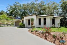 28 THE PARKWAY PLACE MAPLETON QLD 4560 $600,000s BIT ABOUT THE PROPERTY: If functional and aesthetic space is a buyer priority, this Mapleton home has plenty of appeal, with 268m2 of tasteful living and entertaining space, 2242m2 of landscaped grounds and room for extra vehicles. The property nestles among other quality homes in a winding cul-de-sac in a beautiful natural setting only 1km to the heart of Mapleton Village with its historic tavern and a range of eateries and amenities. The steel-framed residence is only 3 years old, very well built and clearly well maintained. With 4 generous bedrooms, 2 bathrooms, a study and choice of living areas, the residence offers a superb lifestyle for a range of buyers. WHY PICK 28 THE PARKWAY PLACE, MAPLETON? The home is spacious with quality design, fittings and finish, and the setting and location are excellent. Mapleton has a quieter lifestyle than the tourist centres of Montville and Maleny further along the Blackall Range, yet has an enviable range of services and facilities, including medical clinic, bowling club, library, state school, post office, cafes, IGA and service station. Quiet quality lifestyle with village convenience on the doorstep is a desirable combination. FEATURES INCLUDE: - 4 bedroom, 2 bathroom 268m2 steel-framed Dixon home just 3 years old - Quiet cul-de-sac 1km to village centre - Beautiful treed location among other quality homes - Big main bedroom with en suite and study away from other bedrooms - Spacious open plan kitchen/dining/family room - Separate large lounge room - Well-equipped kitchen with dishwasher, breakfast bar, huge walk-in pantry - Air conditioning - High quality, modern finishes - Private alfresco dining/entertainment patio off main living area - Large double lock up garage - Beautifully landscaped grounds with treed backdrop - 60,000 litre rainwater storage and envirocycle septic system - Separate driveway for storing a boat, caravan or mobile home..