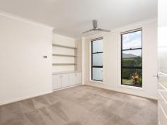 4 Beerwah St, Pacific Pines QLD 4211 $699,000 From the second you step through the huge double doored entrance, this home will blow you away. Offering so much more than you’ve come to expect, 4 Beerwah Street is a stunning ex display home built with all the extras. The home enjoys multiple living and dining areas, stunning high ceilings that top out at a massive 4.8 metres, a huge poolside alfresco entertaining area and an enormous upstairs parents retreat that is sure to impress. - The giant upstairs parents’ retreat combines the bedroom, ample living space, balcony, oversized his & hers ensuite with spa bath & a great sized walk in robe with custom storage - Huge air conditioned family room overlooks the pool - Massive kitchen with stone benches joins the main family room, dining area and overlooks the poolside entertaining space - Additional large living/TV room joins the dining space - Covered rear entertaining area seamlessly flows from the interior living & dining and leads into the sparkling pool - A stunning 4.8 metre high void spanning 45m2 gives the home a sense of space and grandeur - Three large bedrooms on the ground level - Spacious main bathroom is also ensuited to the second bedroom - Functional laundry with ample bench space - Double lock up garage - Low maintenance gardens/yard at the front and rear - Land Size: 691m2 - Rental Appraisal: $710 - $750 per week - Council Rates: $1,841 p.a approx - Year Built: 2005 A house of this quality deserves an equally great location and its convenient position doesn’t disappoint. 4 Beerwah Street is walking distance to numerous local amenities such as schools, the new Coles shopping complex, parks, public transport, and is just a short ten minute drive from the new Coomera Town Centre, Helensvale Westfield, Helensvale train/light rail station and the m1 for an easy commute to Brisbane or the Coasts famous beaches.