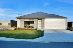 52 Aquamarine Parade Treeby WA 6164 The stunning “Calleya Estate” in Treeby is the fitting setting for this impressive brand-new 4 bedroom 2 bathroom home by Dale Alcock on a commanding northwest-facing corner block with so much to love about it. Two separate living areas cater for everybody’s personal needs here through their modern style and overall spaciousness, including a carpeted theatre room and a beautifully-tiled open-plan family, dining and kitchen area that doubles as the main hub of the house. Sparkling stone bench tops in both bedrooms and the kitchen complement a flowing and functional floor plan, also including a secure remote-controlled double garage and a private rear entertaining alfresco with a splendid north-easterly aspect to enjoy. A first choice for many aspiring famalies, “Calleya” plays host to a plethora of local parklands – the nearest reserve and children’s playground being just walking distance away – whilst also indulging a very close proximity to the new Cockburn Aquatic & Recreation Centre (ARC), a junior BMX track, a dog adventure playground, barbecue facilities, Atwell Primary School, Cockburn Gateway Shopping Centre, Cockburn Central Train Station, the freeway and everything in between. This is low-maintenance living at its absolute finest! WHAT’S INSIDE: • 4 bedrooms, 2 bathrooms • Light-filled living spaces • Spacious tiled open-plan family/dining/kitchen area with stone bench tops, stylish light fittings, double sinks, tiled splashbacks, a huge walk-in pantry area and a breakfast bar for casual meals • Quality 900mm-wide Artusi appliances, including a stainless-steel range hood and a five-burner gas-cooktop and oven combination • Large carpeted theatre room • Carpeted bedrooms, including a generous front master suite with a large walk-in wardrobe and a quality ensuite bathroom, comprising of twin “his and hers” stone vanities, a shower and a separate toilet • Spacious 2nd/3rd/4th double-sized bedrooms with mirrored built-in robes • Sleek main bathroom with a separate bathtub, a shower and a stone vanity • Separate 2nd toilet • Linen press • Practical laundry with a linen press and outdoor access to a north-facing drying courtyard • High ceilings throughout WHAT’S OUTSIDE: • Remote-controlled double garage with internal shopper’s entry • Private rear entertaining alfresco • Sprawling front-yard lawns • Easy-care gardens • Side-access gate EXTRAS: • Built by quality W.A. builder Dale Alcock Projects • Green Title corner block • Quality blind fittings throughout • Feature white skirting boards • Feature down lighting • Ducted and zoned reverse-cycle air-conditioning (with touchpad controls) • Instantaneous gas hot-water system • Reticulation LOCATION: • 25-minute drive from Perth CBD • Close to the freeway, shopping and public transport at Cockburn Central (just four stops to the city) • Walk to a plethora of local parklands with playgrounds • Within effortless walking distance of the proposed town centre where childcare facilities and a café are set to open in late 2019...