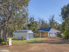 4 Wilson Street Nannup WA 6275 $275,000 Stylish 2 bedroom, 2 bathroom home in need of a few finishing touches. Large spacious lounge area with great views onto back deck and bush. New modern kitchen and a large master bedroom with walk in robe and ensuite. Second small bedroom with ensuite. Would suit a couple who don’t mind doing the final work. 6 x 6 metre garage, great driveway and backing onto reserve and walk trails by the river. Set in a quiet street, close to town and parkland this is a great little buy.