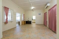4 Velution St, Goondi Hill QLD 4860 $250,000 Large solid concrete Low set home Featuring *3 bedrooms main bedroom air-conditioned plus an air-conditioned office *Large air-conditioned living area *Large bathroom with new vanity *Ceiling fans throughout *Partially screened *Vinyl floor coverings *Double lock up carport *Workshop *Large garden shed *Fully fenced yard *Situated only minutes walk to shops and schools *Golf course literally across the street *Side access to large corner block fully fenced 1012m2 yard. This property is a must to inspect!
