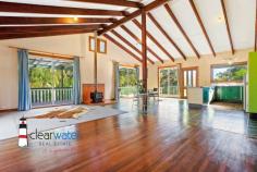 148 Ridge Rd Central Tilba NSW 2546 $690,000 "Kennocha" - Not far from Central Tilba and a short drive to Mystery Bay with its many pristine beaches, is this lovely home set on approximately 7 acres. Relax, sit on the covered veranda and enjoy the surrounding bushland with an amazing amount of birdlife and animals. The Home: High ceilings with hardwood beams, timber floors, open plan living, dining and kitchen. Lots of large windows and doors leading onto the wrap around veranda. Three good sized bedrooms, central bathroom, separate toilet and spacious laundry are located at the rear of the home. Access is via steps at the front, near level entry at the rear or a ramp leading onto the side veranda for those who cant handle stairs. Power is connected to the home plus there is solar hot water and eight panels to lessen your electricity account. Water storage, approximately 90,000 litres. Acreage: 2.67 hectares approximately with some fencing. There is an established orchard, macadamia, olive, and many other fruit trees. From Ridge Road, there is a gently sloping driveway leading up to the home, shed, caravan and the carport. Caravan: Ideal for extra visitor accommodation when those unexpected guests turn up to enjoy your rural piece of paradise. A carport has been built over the caravan for protection and comfort in the warmer summer months. Rustic Workshop: Art Space, Man/Woman Cave, Games Room, Workshop, Craft Room etc. Make this space what you want it to be. Location: Located close to Corunna Lake, not far from Central Tilba and a short drive to Mystery Bay, Narooma or Bermagui.