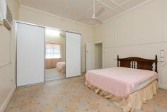 4 Velution St, Goondi Hill QLD 4860 $250,000 Large solid concrete Low set home Featuring *3 bedrooms main bedroom air-conditioned plus an air-conditioned office *Large air-conditioned living area *Large bathroom with new vanity *Ceiling fans throughout *Partially screened *Vinyl floor coverings *Double lock up carport *Workshop *Large garden shed *Fully fenced yard *Situated only minutes walk to shops and schools *Golf course literally across the street *Side access to large corner block fully fenced 1012m2 yard. This property is a must to inspect!