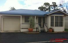 9/51 Edward Street Dalby QLD 4405 $184,000 Quality built 2 bedroom open plan free standing unit on pier and beam foundations with it's own title. Ceiling fans and built ins in both bedrooms. A good distance back from the street thereby eliminating traffic noise. Front porch for morning sun. Separate formal lounge Paved entry from street into the single remote lock up garage with direct access to the unit for cold or rainy days. Air conditioning and ceiling fans make the internal climate really nice. Modern kitchen with pantry and dishwasher and good sized living area internally along with a private enclosed rear entertaining area out back. Good sized bathroom with separate bath and roomy shower, separate toilet. Unit is currently tenanted if you are looking for an investment and well priced in today's market returning a gross 6.4%.