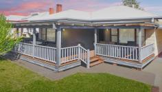 74 Noorilla Street, Griffith, NSW 2680 $425,000 Through the white, picket fence, this traditional weatherboard home with wide front verandah has been lovingly updated and is sure to impress with it's charm and character, featuring high decorative ceilings and a cosy gas fireplace. A functional kitchen with plenty of storage, electric cooking, dishwasher and double fridge area leads to dining and light filled separate lounge. Three spacious bedrooms feature stunning polished floor boards. Refurbished neutral bathrooms each have a separate toilet. A full size separate laundry with timber bench completes the indoor package. Outdoors offers a secure yard with under cover BBQ area, 4 car covered accommodation and single lock up garage with mancave. This home is set on a generous allotment of approximately 708m2 and is positioned in an excellent location within a few hundred meters to parks and hospital precinct; Just completed new plumbing and wiring, ducted gas heating, updated evaporative cooling and enclosed yard this home is a must to inspect.
