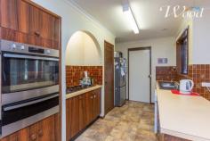 562 Iluka Crescent Lavington NSW 2641 $295,000 Originally constructed with a granny flat configuration, front bedroom, lounge with own front door. Set on 921sqm's of land with good shedding. There is no denying this 4 bedroom home needs a renovation but when you take a look at what you have to work with, this could make for a wonderful home or investment. Offering 3 living rooms, master with en-suite & walk-through robe. Access to a large lounge room from the master could be a great opportunity to utilise as a granny flat, parents retreat, work from home office with front street access or 3rd living. The formal lounge includes a wood fire, ducted cooling throughout, a refrigerated air conditioner and formal dining. The original kitchen offers a gas cooktop, modern electric wall oven, good bench space and a dishwasher. This then opens up to a family room if you use the formal dining. The other 3 bedrooms offer built0in robes and are serviced by a full main bathroom and separate toilet. The separate laundry offers good cupboard and storage too. The block is level and well laid out over 921sqm's which includes a covered pergola area to entertain, triple carport plus a double lock up garage down the rear of the block. The home is located in what I call a perfect spot for a family with kids. With Lavington East Public school around the corner and Murray High about 1 minute away, where my 4 boys enjoyed their school years. In addition, Holy Spirit school and child care is not far away either. We have been leasing this home out since 2007, which is a very long time at $305.00 per week and could easily continue this way or make it your family home.