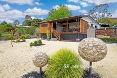 3485 Maintongoon Road Bonnie Doon VIC 3720 $468,500 LAKESIDE LUXE WITH A CONTEMPORARY TWIST * Yes, I’ll admit, I’ve had a bit of work done….you’ll certainly be able to tell! * How’s this for a makeover!? Now a stylish, spacious home on 816m2 (approx) * Fully renovated inside and out, with character and style you’ll absolutely love * Comprising 4 good-sized bedrooms, 2 bathrooms and 2 living areas * Sparkling kitchen with butlers pantry & quality stainless-steel appliances * Combined, light-filled family lounge/dining with Euro fireplace * Can’t agree on what to watch? There’s a second separate living area too! * Master bedroom is spacious, and features BIR’s, plus a split system * Two bathrooms, include family bathroom/laundry with freestanding tub * Large front and rear deck areas, perfect for entertaining day or night * You’ll love the front entertaining deck, with servery window into the kitchen * Big day on the lake? Ease those aches in the bubbles of the heated spa * Double carport (with high roof), plus further lock-up shed and skillion area * Great storage inside and out, plenty of room for all the tools and toys * Fully landscaped yards to ensure easy maintenance and style year-round * Glorious views of Lake Eildon and the bucolic bliss of the surrounding hills * An ideal weekend retreat, or capitalise on the booming holiday rental market * Being sold W.I.W.O, all you have to do is walk right in and sit right down! * You’ll kick yourself if you miss out on this one – call today for your inspection Features Air Conditioning Area Views Built-In Wardrobes Close To Schools Close To Shops Creative Heating Spa...