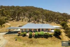 16 O'Malley Place Mount Campbell NSW 2620 $1,050,000-$1,095,000 Outstanding opportunity to enter this prestigious and tightly held enclave of quality residences on semi rural small acreage. Enjoy all the glorious benefits of a rural lifestyle without the headache of large acres and be only moments from the new Googong Township and Queanbeyan. This welcoming lightfilled residence set on a 6927 m2 (1.7 acres) approx.. block offers a terrific functional floorplan with plenty of flowing living space including a large rumpus room big enough for a full sized billiard table! Privately situated and boasting absolute privacy with commanding elevated views this modern family residence boasts four large bedrooms all with built in robes, a three way bathroom and spacious master with ensuite. The informal family space flows to the outside paved alfresco area with a magnificent hill backdrop, similarly the front of the house has a great area to sit and enjoy the vast views over Little Burra and Royalla. The kitchen opens to the family room and meals area and boasts plenty of storage and a pantry. There is a large double garage with auto door under roof, with plenty of room for all the toys and is further serviced by a very large carport (10 x 7 approx). Outside easy care gardens with established mature trees on a pretty block show this great property to its advantage. Canberra CBD is only 25 mins away by all sealed roads. This really is a unique opportunity in a tightly held blue ribbon location and ideal for those downsizing from larger rural acres and who want a more manageable property closer to town. FEATURES: Wonderful location with such close proximity to Googong Township and Queanbeyan and Canberra CBD is only 25 mins away Pretty block with established trees and gardens surrounding the home 6927m2 or 1.7 acres approx.. Stunning elevated views over Little Burra and Royalla and in a very private setting Single level with internal double garage access under roof with auto door Four large bedrooms with built in robes Master with ensuite and three way main bathroom Three separate and flowing living spaces - one a large rumpus room opens to the family space Kitchen with plenty of cupboard and storage and pantry overlooks the family/meals area Outside paved and landscaped alfresco area enjoys its sheltered position with mountain backdrop Double garage plus 10 x 7 approx carport attached Heating - slow combustion wood plus ducted reverse cycle heating and cooling Insulation - Ceilings Hot Water - Electric off peak Community Bore for garden use and use of community land for walking, riding etc. Council Rates - $1500 pa approx Community Rates - $350 pq approx....