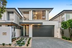 13 HOBART ROAD HENLEY BEACH SOUTH SA 5022 When it comes to choosing a home for your family this one will surely exceed all your expectations. AT A GLANCE * LIVING AREA 345m2 (approx) * 4 BEDROOMS (1 master on lower level) * 3.5 BATHROOMS * 2 LIVING AREAS * ALFRESCO WITH BBQ/KITCHEN FACILTIES * MASTERCHEF KITCHEN * DOUBLE GARAGE WITH INTERNAL ENTRY * SECURITY SYSTEM * EASY CARE LANDSCAPED GARDENS THE LOCATION: Henley Beach South is one of the most desired locations in Adelaide, within minutes to beautiful beaches, Henley Square where you can wine and dine in fabulous restaurants and cafes, local shopping including premium outlets at Harbourtown, a great selection of public and private schools, Adelaide Airport and an easy drive to Glenelg and the CBD. THE HOME This stylish architecturally designed Torrens Title home showcases a high level of quality over two luxurious levels, no expense has been spared. Lower Level * Bedroom 1/Guest room with walk-in robe and deluxe ensuite with floor to ceiling tiles * Separate powder room with vanity and wc * Wide entry hallway with staircase to upper level * Fantastic open plan living area with plenty of natural light and direct access to the Alfresco * Masterchef' kitchen with quality Euro stainless steel appliances, dishwasher, mirrored splashback, breakfast/preparation bar, stone bench tops and a very spacious walk-in larder/pantry * Private study with built-ins * Laundry with plenty of built-ins and outside access * Alfresco with built-in Beefeater BBQ, kitchen facilities and ceiling fan * Double garage with built-in storage cupboard, auto panel lift door and internal access Upper Level * 2nd Living/Activity area * Bedrooms 2, 3 & 4, all with built-ins * Bedroom 4 or master bedroom with deluxe ensuite and walk-in robe * Family bathroom with full size bath, extra-large shower alcove, vanity and the convenience of a separate wc SO MANY FABULOUS FEATURES INCLUDING: * Alfresco with Beefeater BBQ + Euro 120cm rangehood and ceiling fan * Stone bench tops kitchen, pantry and vanities * Combination of 2pac and laminate joinery throughout * Ducted Daikin air conditioner * Escea gas fire in open plan area * Full height tiling to all bathrooms * Frameless shower screens * Quality tiled floors in main living areas * Quality carpet throughout upper level * Aluminium windows and door frames to all external openings * Exposed Aggregate paths and driveways * Garden beds, lawn, automated irrigation system, stormwater and rainwater tank * Security system * Hills Home Hub * Data Antenna & Foxtel provision in all bedrooms and living rooms * Intercom to entry with video monitors to upper and lower level This is a superb home in a fabulous location, INSPECTION A MUST!