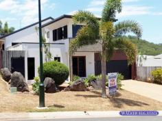 13 Barringtonia Street Mount Sheridan QLD 4868 $600,000 With great street appeal and surrounded by other quality built homes this beautiful multi-level family home enjoys an elevated position, stunning views from every angle and modern fittings throughout. Built in in 2010 and freshly painted you get the impression of elegance as you walk through the double timber door entrance into the foyer. The master bedroom, walk-in robe and en-suite are on their own level for privacy. There is internal access from the foyer to the wine cellar and double remote garage. Internal timber stair case leading up to the main level comprising: • A large open plan living and dining area with raked ceilings with four sets of full height glass sliding doors allowing lots of natural light, breeze and views from every direction - flowing out onto the timber deck creating the best of ‘indoor/outdoor’ living - perfect for entertaining family and friends. • Cooking is made easy with a large chef’s kitchen equipped with a quality built in water filtration system, stainless steel range hood, Westinghouse gas cooktop and electric oven. Central prepping island bench including breakfast bar complete with power points and central to all entertaining. • Bedrooms two and three have built-in robes and are set on either side of the main bathroom (separate shower and bathtub) internal laundry and separate toilet. • Mezzanine Level: Set behind the kitchen and above the foyer on a mezzanine level is the fourth bedroom/study overlooking Forest Gardens and enjoying spectacular 180° views. • Fully air-conditioned, tinted glass, Crimsafe screens/doors and tiled throughout the living areas with carpet to bedrooms keeps this home cool, private & secure. With the benefit of a 7 Kilowatt solar power system. • Landscaped and easy care gardens, lemon & lime trees with a passionfruit vine overhanging the gazebo makes for great family fun time and fully fenced. Set in ever popular Forest Gardens close to walking tracks, parks, schools, shopping and only a 15 minute drive to Cairns CBD. This unique home is sure to impress. Call today to book your inspection.