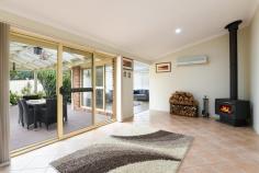 6 Carinya Way Gerringong NSW 2534 $840,000 This well-presented single level family home is located in a quiet and much sought after position offering a real village atmosphere. The neighbourhood is family friendly with no through traffic and the picturesque Werri Beach is a level walk from home. A surprisingly generous sized home which would be ideal for the growing family, retiree or investor. Recent renovations have given the home a wonderful makeover offering a bright and modern decor. The spacious floor plan allows for a relaxed lifestyle with three living areas including lounge, rumpus and family room plus separate dining. The newly installed kitchen is an absolute delight with a large work area modern appliances and ample cupboard space. Add three good sized bedrooms with walk in robe and ensuite to main, large undercover entertaining area, solar hot water, double garage with extra work room, space for your boat or caravan, a level 650m2 (approx) corner block and you can see why this very appealing home represents great buying. An inspection will more than impress! - Well presented single level family home - Located in a quiet sought after position - Recently renovated throughout - Multiple living areas lounge, dining, family and rumpus - 3 large bedrooms with ensuite & W.I.R to main - Brand new kitchen with modern appliances - Large undercover entertaining area - Split system air conditioning - Solar Hot Water system - Side access for boat or caravan - Generous sized double garage with extra work room - Large 650m2 level parcel of land (approx)..