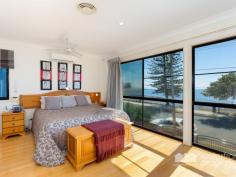 5 KENNEDY ESPLANADE, Scarborough | Waterfront Properties Redcliffe Rare opportunity - North facing beachfront home! This rare opportunity to own this North facing beachfront home with amazing views across the bay is one not to be missed. On a 675m2 block this large rendered brick home has a great open plan design to maximise the spectacular views. Some of the features of this stunning home include: - North facing on 675m2 block - Beachfront with amazing views - Open plan living/kitchen/dining - 4 Generous size built-in bedrooms (4th bed has 2 way bathroom) - Huge master suite with WIR and ensuite - Ducted air-conditioning throughout - Security system - Side access ideal for boats & caravan - Triple garage Positioned right on the beach and only a minutes walk to Scarborough Shopping Village this impressive property boast many more features, too many to list! Call Kevin on 0418 125 356 today to arrange a private inspection!