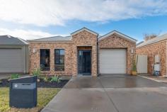 41B Tiller Drive Seaford SA 5169 $379,000-$389,000 What a great opportunity to secure a near new home in a great location that provides easy care and maintenance whilst still providing modern open plan living with surprising size and style. Comprising 3 large bedrooms (master with ensuite) and built in robes throughout, modern hostess kitchen with stainless steel appliances, 2 huge living spaces with effortless choices of lounge and dining room configurations, large family bathroom and separate laundry facilities. Your comfort is managed by ducted air conditioning and under floor heating and serviced by cost effective solar power. Parking is provided behind a secure garage door with an added internal benefit of an office/work room included in the facilities. Outdoors, the gardens are super low maintenance which gives you even more time to enjoy your large under cover entertaining area, ideal for those family gatherings or protection from the weather. An ideal home for those looking for something just a little bit special! Call Peter White for more information or to view this property or for a Free Property Market Update click on http://raywhitechristiesbeach.com.au/sell/property-appraisal/ Ray White Christies Beach, Number One Real Estate Agents, Sale Agents and Property Managers in South Australia. peter.white@raywhite.com 3/33 Beach Road, Christies Beach www.raywhitechristiesbeach.com RLA269771 FEATURES: Air Conditioning Built-In Wardrobes Close To Schools Close To Shops Close To Transport Garden...