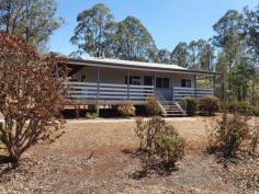 84 CRUMPTON DRIVE BLACKBUTT NORTH QLD 4306 $320,000 This 2 bedroom home with builtins, has polished floors, a woodstove to cook on in winter to keep you warm & an electric stove to cook on in summer. It has 3 ceiling fans, fully screened, and a verandah on 2 sides. The property has a 40x20 lock up colour bond garage, to park 3 cars and a workshop area with power, water , tiolet and the laundry. This property also has a large storageshed/animal shelter , which is 3/4 concreted with a 40x20 fenced area. The block has been selectived cleared with a dam, and is nearly fully fenced , with good fertile soil for growing. It backs onto the rail trail, which is popular as a walking track, horse riding , or push bike riding.