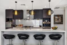 13 Carter Street Magill SA 5072 $980k - $995k Awarding winning designed family home, built in 2013 on 725 sqm with 3/4 bedrooms, 2 bathrooms, 2 living areas, secure parking for 5 – oozing with designer finishes and impeccable style. This ultimate family home, with a flexible floor plan, will surprise and delight the most discerning buyers with the superior quality throughout to provide a relaxed lifestyle for the whole of the family. Enviable features include: – Glamorous entry with porcelain tiles – Light filled rooms with luxury carpet – Luxury window trimmings – Abundant storage facilities – Up-to-the minutes designer fixtures and fittings – Ceiling fans throughout – Double glazed windows, double insulation – Daiken ducted reverse cycle air conditioning throughout – 3 double sized bedrooms, two with built in robes – Main bedroom with double robes and luxe ensuite – Large fourth room, or fourth bedroom or study – Two living areas and dining area – Expansive state of the art kitchen with Smeg appliances, Caesar stone bench tops. Smeg appliances include – oversized electric oven, 6 burner gas cooktop, integrated dishwasher, convention oven doubles as a microwave, inbuilt coffee machine – Butler’s pantry with additional sink, filtered water and abundant cupboard space – Electric window blinds and French pleated screening – Two outdoor areas, a covered convivial patio area and an expansive paved pergola area – all ideal for alfresco entertaining – Tranquil outdoor water features – Secure garaging for two cars with access indoors – Drive through access to rear – Secure rear garage for three cars – the car enthusiast’s dream. Alternatively, ample storage area or gymnasium – Established, reticulated, low maintenance gardens – Security system – Sensor lighting and window locks – Excellent nearby schooling options – 15 minutes to Adelaide CBD, easy access to public transport – Multiple choices of shopping facilities – An ideal chance to spoil the whole family with this luxurious, meticulous designer home offering the opportunity to entertain family, friends or business clients. Inspect today to pursue your dream!..