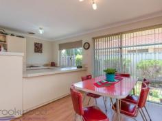 47A Eileen Street Bassendean WA 6054 $419,000 It will be all sunshine and song in this freestanding strata home set in an established Bassendean neighbourhood within walking distance of the river, station and shopping centre. The 3 bedroom, 1 bathroom property is surrounded by a well-tended garden and features open plan living flowing out to a spacious, sheltered alfresco entertaining area. 3 bedrooms 1 bathroom 1995-built brick and tile Formal & informal living O.P. kitchen family meals Main bed w semi-ensuite Large outdoor entertain Auto reticulated gardens Chooks & raised veggies 369 sqm estab n’hood Stroll to the Swan River A cheery red door sets the tone of this delightful, freestanding strata property. Light, open and with a flowing floor plan, the home boasts both formal and informal living, a spacious kitchen/meals/family and seamless movement from indoors to the large alfresco entertaining area. A formal lounge with reverse cycle air-conditioning and the main bedroom are arranged at the front of the property, a layout that delivers an adults’ zone with a degree of privacy. Large windows ensure the bedroom is bathed in natural light while a walk-in robe, semi-ensuite and ceiling fan make for a comfortable and well-appointed space. The ensuite is fitted with a bathtub, a separate shower and a vanity. A spacious open plan kitchen/meals/family room orientated to the north-facing verandah provides seamless indoor-outdoor living. A U-shaped bench defines the kitchen with a wall oven, 4-burner gas hob and good storage – a plumbed and powered dishwasher cavity is in place. The meals area looks to the surrounding gardens. A separate junior wing contains 2 bedrooms – each with a built-in robe and Berber carpet – a walk-through laundry and a separate W.C. The junior bedrooms have access to the semi-ensuite. The overwhelming sense of space and light afforded this property has much to do with the much-loved and well-tended gardens. At the front, a lawn and lush plantings create great street appeal, while gardens bordering the covered entertaining area bring a sense of seclusion and relaxation. Adding to the ‘country’ vibe is a chicken coop and run with raised veggie bed and citrus trees. Keeping this green oasis looking its best is made easier by automatic reticulation, there is even a small secure store room for keeping gardening equipment. A fabulous option for those looking to downsize or first home buyers, this property offers open, light-filled living in a friendly, established neighbourhood with terrific access to the river, shops, schools and train station. To arrange an inspection of this property or for the best advice, the best service and the best solutions call “The Expert” Ken Wiggins on 0403 012 950....