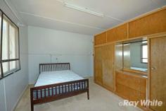 40 Warren Street Goovigen QLD 4702 $79,000 If you're looking to get away from it all, this is an opportunity worth investigating. A little work is needed, but it would be the perfect next project for the right buyer. High-set home with enclosed under-house area. Large living and dining. Functional kitchen. 2 bedrooms, master has built in robes. Front sleep out, sun-room or office area. Large capacity, poly rainwater tank. Huge 1214* sqm allotment. Walking distance from the local Hotel and the "Golden Park Retreat". This property would serve as the perfect base for "Grey Nomad" tourists. What more could you ask for? Inspection by appointment with the Agent....