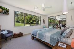 235 Paynters Creek Road Rosemount QLD 4560 $1,275,000 It's a rarity to find a property that offers a unique combination of quiet and peaceful seclusion, multiple lifestyle possibilities and convenience. This expansive, eco-friendly, custom built residence is positioned on 1.7 acres. The quality of this home is immediately apparent; from the spacious entry you are led into the welcoming, large open plan living/dining areas featuring 4.6 metre high ceilings, stacker doors that flow out to a grand alfresco area overlooking the saltwater pool and peaceful bush backdrop, embracing the Queensland lifestyle in complete privacy. This property boasts a stunning kitchen with quality Fisher & Paykel appliances including a pyrolytic wall oven and a 'Gas on Glass' cooktop. Also featured are Caesarstone benchtops, large servery and a butlers pantry with abundant storage and second sink. The home presents with four large bedrooms, all with built-ins, a grand master suite with walk-in robe and an impressive fully tiled ensuite boasting double vanities and a double shower. Cleverly designed, your family will have options galore with an additional media room/office, lounge/rumpus area, a games room with custom built-in bar, internal laundry with ample storage, two further luxurious bathrooms, separate powder room, three car garaging and a custom designed shed. The versatile floor plan could easily be set up for dual living. Located in a sought-after dress circle acreage belt just 5-15 minutes to Bli Bli shopping village, private schools, beaches, river, Sunshine Plaza and Sunshine Coast Airport - the location provides quick, effortless access to everything you need. No expense has been spared on fit out and build, and everything is of the very highest quality. This property must be inspected to understand its scale and beauty. Private, 1.7-acre parcel Eco-friendly, custom designed residence Stunning 78,000L saltwater swimming pool Lavish stone kitchen with separate butlers pantry Flexible layout, can easily be set-up for dual living Large open plan living & dining areas flooded with natural light 4 bedrooms, media/office, games room & second lounge/rumpus 3 fully tiled bathrooms with stone benches throughout 3 car garaging + a 56sqm. custom designed shed Secure, fully fenced backyard Separate powder room 6.6kW solar system 2 x 12.5kW ducted & zoned air-conditioning systems 2 x 22,500L in-ground concrete water tanks 2 x gas instant hot water systems...