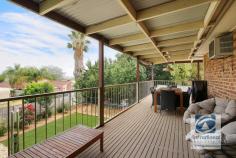 9 Peacock Avenue West Wodonga VIC 3690 $399,000 In one of West Wodonga's most admired locations and offering the most convenient of lifestyles, is this impressive family home. Built with the growing family in mind, this large double storey residence combines the space, comfort and style so often sought yet seldom found. With living spread across both levels, the home comprises of five bedrooms plus a study all featuring built-in storage and ceiling fans, the master is finished with a walk-in robe and convenient ensuite. Upon entering the home, you are greeted by the naturally flowing floor plan with thoughtfully designed kitchen area and dining room adjacent. The kitchen features plenty of storage options, gas cooking and incorporates views from the elevated position. The large lounge room is a real family area, the perfect space for family movie nights. Downstairs lies two bedrooms sharing access to a second living area presenting as an ideal teenage retreat. Enjoy entertaining all year round with the rear balcony offering 180 degree views and ample space for a BBQ and outdoor dining table. Further entertaining space is available downstairs with access to the low maintenance rear yard which the kids are sure to enjoy. A large double garage with additional carport space, enough room for a further four cars ensure the family vehicles are secure no matter how big the family is. Other additional features include ducted heating and evaporative cooling plus fantastic storage under the house. Positioned in an enviable location this property is sure to tick all of your boxes and provides enough room for the entire family. Call today!