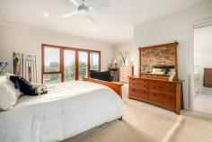 14 Hectors Hill Cl East Maitland NSW 2323 $849,000 This beautifully positioned home is set in a private cul de sac on a 1,177m2 block in the ever popular Rathluba Estate, East Maitland. Upon entry the foyer leads firstly to the spacious formal living room on the right. To the left is the first of 3 bedrooms, featuring an ensuite, walk in robe and separate private entry with courtyard. Moving through to the kitchen that boasts an abundance of bench space and storage including the semi walk in pantry. Ideal for families who love entertaining, the kitchen overlooks the open plan living/dining area and leads up to the separate formal dining room that can also be utilized as a media room or children's activity room perfect for the growing family needing their own space. Off the kitchen is the hall that leads to the main bathroom and second bedroom which also features its own private entry and courtyard. The master suite is impressive in size and boasts wall to wall built in robes, ensuite and beautiful views with direct access to the rear deck. Stepping outside, the elevated deck offers spectacular views whilst also overlooking your fully fenced yard and let's not forget the sparkling in ground concrete pool and barbeque area. With accommodation for 5 cars, workshop and storage space spanning the length of the property, this home is any tradesman's dream! The garage is also connected to the fully self-contained granny flat/studio or teenagers retreat. Other key features include, air conditioning, ceiling fans, skylights, high ceilings, double brick exterior end walls, quality polished timber flooring, multiple storage options, laundry with built in benches and beautifully manicured lawns and gardens. 14 Hector's Hill Close, East Maitland is located just 2.8km from Stockland Greenhills Shopping Centre and entertainment precinct, 3.2km to Maitland Private Hospital and medical facilities, 1.7km to schools and childcare facilities and 9km from the Hunter Expressway this home provides the peaceful lifestyle you crave with the convenience of town living when required.