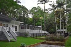 774 Friday Hut Rd Binna Burra NSW 2479 $1.325m With all the expense & hard yards spent on the major renovation carried out 18 months ago - the only thing left is to start living the dream! Set on the beautiful tree lined Friday Hut Road, only 5 minutes drive to the village of Bangalow - in a peaceful & private location, is this gem of a home on 1 acre of easy care landscaped grounds with magnificent established trees - which must be sold. The home is a gorgeous, open plan, stylish retreat - perfect for young families, tree changers or retirees wanting the family & friends to come for extended holidays. If you are considering a hinterland or Bangalow/Byron lifestyle - then do not look past this one! A few of the highly sought after features are new kitchen & bathrooms, a master suite , polished floor boards, picture windows looking out over lush lawns and tropical gardens, extensive decking & outdoor living, inground pool & pool house, town water & an easement to the creek & school bus only 2 minutes away with Bangalow a 5 min drive...