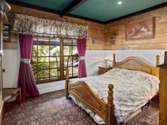 91 Denny Road Nannup WA 6275 $645,000 If you love character in a home then there is no doubt you will fall wildly in love with this one! A decade of work results in a spectacular creation from the unusual gate, the wysteria trellis, the rocky waterfall, the rusty bits of iron in the garden and timbers from both the Busselton and Bunbury jetties in the house. Sitting on a lovely 6.6 acres with Blackwood National Park to the front and the Blackwood River at the back this three bedroom, two bathroom home with its brick hearth and huge jetty beams breathes character from every pore! The mostly native gardens are easy to keep and stunningly attractive. The large back deck looks onto a waterfall with a pond at the base and views of the distant hills. Large shed, fenced orchard and vegie garden, not to mention a fox proof chook pen plus a second smaller waterfall complete the picture. Large dam at the bottom of the block supplies water for the garden and waterfalls with power in 3 places plus gorgeous riverfront views down at the bottom of the block. This has to be seen to be appreciated.