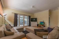 8 Carey St Tumut NSW 2720 $450,000 You will love the large layout of this four-bedroom family home, ideally positioned for all those lifestyle needs of an active family and boasting an enormous 1,349m2 allotment, your possibilities here really are endless. Comprising of multiple indoor living areas, four great sized bedrooms, an oversized multi-purpose outdoor entertaining area and a plethora of space for the kids to play, you will love calling 8 Carey street your home. Call today and book your inspection! Premiere Features: - Four great sized bedrooms all with built in robes - Main Bathroom centrally located and boasting large separate bath, shower and toilet, with an additional powder room area off the entry - Additional renovated second bathroom acting as combined laundry, with good storage options, shower and toilet - Great sized electric kitchen with ample storage options and workspace - Large sun filtered open plan living area positioned to the rear of the plan, with split system air conditioning, wood box fire heater and French doors for direct access to the rear yard - Extra-large fully covered patio serving as dual covered off street parking and large outdoor entertaining area - Large formal dining, with timber flooring, built in fire and ducted evaporative air conditioning, perfect for that much desired second lounge - Double bay shed with power - Additional single bay shed - Rainwater tanks - Fully fenced yard - Extremely large 1,349m2 allotment walking distance from town and rear vehicle access - Positioned directly adjacent River Glade oval - Ducted Evaporative air conditioning throughout - Formal entry with additional storage options - Third outside toilet Positioned a short stroll from the center of town, Tumut river walking tracks and local sporting fields, this large four-bedroom family home is sure to tick a lot of those boxes ideal for growing families. Do not miss your opportunity to secure such a great family home. Call today and book an inspection!..