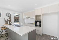 2/19-21 Mount Brown Road Dapto NSW 2530 $545,000-$595,000 It's time to be the envy of your friends. Residing in one of the most impressive developments built in the Mount Brown area, this three bedroom townhouse has a lot to offer. Beginning with the open plan living and dining area on the ground level combined with the quality kitchen with stainless appliances and stone bench-tops. You will find extra storage under the stairwell adjoining the kitchen. The living area leads out to the covered entertaining area and fenced yard ensuring your privacy. On the second level there are three bedroom's all with built in wardrobes and a generous bathroom with free standing bath and separate shower facility. Quality finishing including floor to ceiling tiles and accessories. The oversized main bedroom showcases magical views towards the beautiful Illawarra escarpment also boasts a luxurious en-suite with floor to ceiling tiles. You have an internal laundry plus separate powder room and lock up garage with internal access. Located close to schools, shops, and transport. View today and pack your bags.
