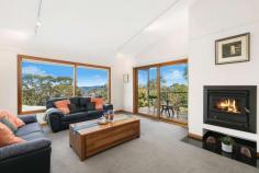 122 Sublime Point Road Leura NSW 2780 Offering the best of the native flora the Blue Mountains is known for, with views and a low maintenance Australian native garden, this inviting 4-bedroom home over two levels has it all. Large rooms throughout offer plenty of flexible living options, all with an abundance of natural light. An outdoor deck makes the most of the property's location and offers an ideal space for entertaining. The perfect combination of contemporary style and easy charm, this home is a retreat amidst the native landscape. 4 large bedrooms with ample storage, with master bedroom on upper floor featuring both an ensuite and private balcony. 2 bathrooms, with 3 toilets. Large open-style kitchen, custom-built, with black granite benchtops and modern appliances. Heating throughout with a fireplace, underfloor heating in the bathrooms and natural gas central heating Eco-friendly solar panels, and water tanks to provide rainwater or mains. Separate living and formal lounge areas. Large outdoor deck with delightful leafy views across large 1815m2 block. Large windows offering an abundance of natural light, framed in Western Red Cedar. Plenty of space, giving potential for an at-home office, gym, or hobby area. Views of the surrounding bush and National Park, with filtered views towards nearby escarpments. Low maintenance Australian native garden offers relaxing setting and attracts native bird life. Offering such a combination of space, eco-friendliness and living potential, this is one you need to see to believe....