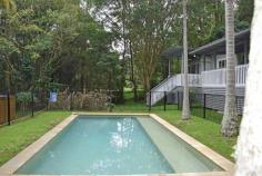 774 Friday Hut Rd Binna Burra NSW 2479 $1.325m With all the expense & hard yards spent on the major renovation carried out 18 months ago - the only thing left is to start living the dream! Set on the beautiful tree lined Friday Hut Road, only 5 minutes drive to the village of Bangalow - in a peaceful & private location, is this gem of a home on 1 acre of easy care landscaped grounds with magnificent established trees - which must be sold. The home is a gorgeous, open plan, stylish retreat - perfect for young families, tree changers or retirees wanting the family & friends to come for extended holidays. If you are considering a hinterland or Bangalow/Byron lifestyle - then do not look past this one! A few of the highly sought after features are new kitchen & bathrooms, a master suite , polished floor boards, picture windows looking out over lush lawns and tropical gardens, extensive decking & outdoor living, inground pool & pool house, town water & an easement to the creek & school bus only 2 minutes away with Bangalow a 5 min drive...