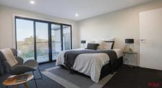 24A Castlereagh Crescent Macquarie ACT 2614 Nestled into the peaceful urban landscape is a sensational Contemporary masterpiece of outstanding quality and superb craftsmanship. Gorgeous free flowing living areas with wonderful relationship to the low maintenance gardens, designer kitchen with Smeg appliances and large walk in pantry with inbuilt laundry, bathrooms of great style, engineered timber floors, high ceilings and large picture windows with mountain views. Spacious master suite with walk in robe, ensuite and views towards Black Mountain Tower, 2 more large bedrooms with built in robes and joint ensuite, a downstairs private guest bedroom with ensuite and large window looking onto the streetscape. Private & gorgeous low maintenance gardens with entertaining area & single lock up tandem garage. Easy access to the Belconnen Westfield/Jamison Centre, Canberra City, Woden, Macquarie Primary & Radford College. A really rare opportunity to purchase a bespoke home within an established suburb. • EER : 7.5 • Expansive kitchen with stone benchtops, soft close drawers and Smeg appliances and canopy rangehood • Wee Jasper stone retaining wall and comprehensive landscaping • Downstairs guest bedroom with ensuite • Beautiful views of Black Mountain Tower • Aircon ducted reverse cycle separate units for each zone for an ultimate convenience to every member of the family. Option to have variable temperature in different rooms • Irrigation system • Smart features such as lights, garage door, security, smart irrigation system (optional) • Glass balustrade stairwell with stainless steel handrail • Double glazed windows • Large bedrooms with Multiple walk in robes & joint ensuites • WIP with laundry and internal garage access • Floor to ceiling tiles with feature tiles • Skilion roof • Designed by well known architect Hugh Gordon • 220m2 house size under roofline, 390m2 apx land, Rates $500pq apx..