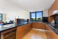29/87 Waratah Ave Dalkeith WA 6009 $1,695,000 Only the finest in quality modern fixtures and fittings have been utilised in the flawless construction of this stunning 3 bedroom 2 bathroom corner apartment, found within Level 2 of the impressive "Dalkeith on Waratah" complex - the first combined-use building ever approved for this exclusive area, built to a high level of workmanship by Giorgi and brilliantly designed by local architects MJA Studio. Leafy courtyards with benched seating precede secure key-card access into the development, where whisper-quiet elevators take you upstairs to your immaculate residence - the highlight of which is a huge tiled entertaining balcony/terrace with a splendid tree-lined aspect and sliding stacker doors that seamlessly extend living to and from the expansive open-plan living, dining and kitchen area. There, gleaming timber floorboards warm the apartment's central hub, inclusive of an individually-designed and expertly-crafted kitchen that boasts sparkling stone benchtops and splashbacks, premium integrated electric Gaggenau appliances, a Vintec drinks fridge and plenty of built-in storage space. The bedrooms are both carpeted for complete comfort, including a sumptuous master suite where a fitted walk-in wardrobe meets a spectacular fully-tiled ensuite bathroom - shower, separate bathtub, twin "his and hers" vanities, toilet and all. The laundry is separate from both the main bathroom and second bedroom, whilst the carpeted study is generous enough to be converted into a third bedroom if need be. Downstairs, two under-croft secure car bays are accompanied by a dedicated lockable storage area. There is also lift access from the carpark for good measure. Enhance your lifestyle and capitalise on this unique location in the heart of Dalkeith's quintessential village shopping precinct, where convenience abounds in the form of a supermarket, pharmacy, florist, dry-cleaner, post office, newsagency and doctor's surgery next door. Enjoy a morning coffee or a meal with friends, wander around an art gallery, purchase a vintage wine or browse the array of retail shops on Waratah Avenue, whilst taking full advantage of the bus stop located directly opposite the apartment to visit the Perth CBD, or one of the fantastic adjoining suburbs - this is living of the absolute highest order! PROPERTY FEATURES; • Contemporary landmark building • Private resident's lobby with water feature and gardens • Pleasant north-east orientation • 3 bedrooms, 2 bathrooms and a study • Large open-plan living, dining and kitchen area with quality finishes and appliances • Easy access out to the generous entertaining terrace/balcony • Kitchen appliance nook • Extra built-in storage to the master suite • Immaculate master-ensuite bathroom • Carpeted 2nd bedroom with built-in robes • Fully-tiled main bathroom with a shower, toilet and vanity • Separate well-appointed laundry with ample built-in storage cupboards, stone benchtops and an internal hot-water system • Separate powder room • Fully-zoned ducted reverse-cycle air-conditioning • Video-intercom security • Feature downlighting • Feature ceiling cornices and skirting boards • Huge 206sqm (approx.) of a combined living and balcony area • Two secure car bays - plus a dedicated lock-up storage area • Additional off-road parking options LOCATION FEATURES; • Close to the city, Stirling Highway and our picturesque Swan River • Minutes from the vibrant Claremont Quarter shopping precinct, private primary and secondary schooling and colleges, outstanding tertiary campuses and a number of medical and community amenities • Easy access to the Nedlands Golf Course, Tennis and Yacht Clubs, as well as the Dalkeith-Nedlands Lawn Bowling Club • Great provision of public transport - with seamless access into Fremantle an added bonus...