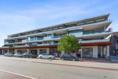 29/87 Waratah Ave Dalkeith WA 6009 $1,695,000 Only the finest in quality modern fixtures and fittings have been utilised in the flawless construction of this stunning 3 bedroom 2 bathroom corner apartment, found within Level 2 of the impressive "Dalkeith on Waratah" complex - the first combined-use building ever approved for this exclusive area, built to a high level of workmanship by Giorgi and brilliantly designed by local architects MJA Studio. Leafy courtyards with benched seating precede secure key-card access into the development, where whisper-quiet elevators take you upstairs to your immaculate residence - the highlight of which is a huge tiled entertaining balcony/terrace with a splendid tree-lined aspect and sliding stacker doors that seamlessly extend living to and from the expansive open-plan living, dining and kitchen area. There, gleaming timber floorboards warm the apartment's central hub, inclusive of an individually-designed and expertly-crafted kitchen that boasts sparkling stone benchtops and splashbacks, premium integrated electric Gaggenau appliances, a Vintec drinks fridge and plenty of built-in storage space. The bedrooms are both carpeted for complete comfort, including a sumptuous master suite where a fitted walk-in wardrobe meets a spectacular fully-tiled ensuite bathroom - shower, separate bathtub, twin "his and hers" vanities, toilet and all. The laundry is separate from both the main bathroom and second bedroom, whilst the carpeted study is generous enough to be converted into a third bedroom if need be. Downstairs, two under-croft secure car bays are accompanied by a dedicated lockable storage area. There is also lift access from the carpark for good measure. Enhance your lifestyle and capitalise on this unique location in the heart of Dalkeith's quintessential village shopping precinct, where convenience abounds in the form of a supermarket, pharmacy, florist, dry-cleaner, post office, newsagency and doctor's surgery next door. Enjoy a morning coffee or a meal with friends, wander around an art gallery, purchase a vintage wine or browse the array of retail shops on Waratah Avenue, whilst taking full advantage of the bus stop located directly opposite the apartment to visit the Perth CBD, or one of the fantastic adjoining suburbs - this is living of the absolute highest order! PROPERTY FEATURES; • Contemporary landmark building • Private resident's lobby with water feature and gardens • Pleasant north-east orientation • 3 bedrooms, 2 bathrooms and a study • Large open-plan living, dining and kitchen area with quality finishes and appliances • Easy access out to the generous entertaining terrace/balcony • Kitchen appliance nook • Extra built-in storage to the master suite • Immaculate master-ensuite bathroom • Carpeted 2nd bedroom with built-in robes • Fully-tiled main bathroom with a shower, toilet and vanity • Separate well-appointed laundry with ample built-in storage cupboards, stone benchtops and an internal hot-water system • Separate powder room • Fully-zoned ducted reverse-cycle air-conditioning • Video-intercom security • Feature downlighting • Feature ceiling cornices and skirting boards • Huge 206sqm (approx.) of a combined living and balcony area • Two secure car bays - plus a dedicated lock-up storage area • Additional off-road parking options LOCATION FEATURES; • Close to the city, Stirling Highway and our picturesque Swan River • Minutes from the vibrant Claremont Quarter shopping precinct, private primary and secondary schooling and colleges, outstanding tertiary campuses and a number of medical and community amenities • Easy access to the Nedlands Golf Course, Tennis and Yacht Clubs, as well as the Dalkeith-Nedlands Lawn Bowling Club • Great provision of public transport - with seamless access into Fremantle an added bonus...