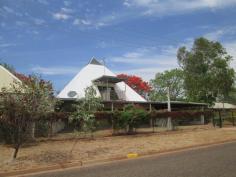 17 Hollis Street Tennant Creek NT 0860 $350,000 As you drive up to the property you will see the electric gate for added security. This 2 story home offers great views from the balcony and is set on 830m2. The kitchen has all modern appliances and plenty of cupboard and counter space with a walk in pantry, slate floors, split system a/c and fans. There are 2 bedrooms on this floor with split system a/c, fans and built in wardrobes. Going up the spiral staircase you will find the master bedroom with its own bathroom. There is plenty of cupboard and wardrobe space as well as the great view from the balcony. Outside is a huge undercover entertaining area and yard with a garden shed, rainwater tanks and another toilet. The property is currently tenanted bringing in $450.00 per week.
