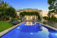 8 SEAVIEW AVENUE KINGSTON PARK SA 5049 SECRET BY THE SEA – Relaxed Beach Residence With Stylish Light Filled Interiors. "Adelaide has a secret - Kingston Park, a small suburb on the coast between Seacliff and Marino. In the heart of this delightful surprise is a gem : a unique 1940s beautifully renovated residence. We are delighted to offer this exclusive beach-side property of impressive grandeur and significance" Rhys Gebethner - WILLIAMS LUXURY This house embraces both its heritage and contemporary make-over to present everything a buyer could seek in a seamless and stylish combination that says, come in, stay awhile, relax and enjoy. Set atop a hill over the foreshore, with stunning north-facing views from Seacliff to Semaphore and, separately, westwards over the Gulf. The home boasts various living areas, comprising both formal and casual lounge rooms, with the possibility of a library or fourth bedroom. With polished boards and luxurious improvements throughout, it includes a chef's kitchen with European appliances, perfect for entertaining family and friends. There's brilliant accommodation with two queen-sized bedrooms downstairs, plus a luxe contemporary bathroom with marble floor and atrium, a discreet kitchenette and laundry. Upstairs, there's the main suite with walk-in robe and bathroom, the kitchen, one of the lounges and indoor and out dining options. Be assured, there's space for full-on family gatherings or private relaxation. And then there are the views! With an almost complete wrap-around balcony maximising the fabulous outlook with a servery from the kitchen, a spectacularly designed heated swimming pool with its own sea view, vine-covered pergola and multiple outdoor entertaining areas perfect for parties or long lunches, this property could be a glorious get-away beach house or a desirable full-time residence. Add ample storage room, side-by-side garaging with internal access, air-conditioning, security system, ducted vacuuming, a comfortable train ride to the city with the station just minutes away. And it's close to the restaurants, bars, cafes and shopping precincts of Brighton and Glenelg. A unique home in a secret suburb with some of the best views in Adelaide. Is this the place you didn't know you were looking for? This truly is the perfect family lifestyle opportunity, defined by timeless elegance and lush established gardens. What makes this home special: • Chef inspired kitchen with carrara marble • North-facing rear aspect • Exquisite coastal views • Meticulously renovated throughout • Close walking distance to public transport and railway station • Minutes-walk to the beach • Views that need to be seen to be believed...