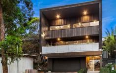 35 Yule Road Merewether NSW 2291 With a design brief to bring the lush leafy views of Myamblah Crescent Reserve inside, this commanding custom built masterpiece uses only the highest quality natural materials. Built over a practical tri-level layout, a combination of raw concrete, stainless-steel, timber and banks of mobile glass bring a warm and organic ambience to this striking, yet homely residence. With the gentle sounds of the swaying trees to calm and expel a tranquil ambience, this luxury family retreat is a private sanctuary that discerning buyers will appreciate. Sitting above its double garage and workshop, the open plan living area is the functioning heart of the home with European oak floors, a statement gas fireplace and full height glass that slides back to connect the interiors to the wrap-around terrace and barbecue area. With the leafy reserve as a verdant backdrop, this warm and inviting living space is anchored by an impressive bespoke kitchen where a 4-metre concrete island is a natural gathering point for family life, and a full suite of Miele appliances make cooking and entertaining easy. Spacious 5-bedroom accommodation is found on the upper level along with a master ensuite, family bathroom, and rumpus with study nook, discreet TV area and private courtyard garden. A myriad of additional features including an executive home office, guest powder room, 5kw solar electricity panels and solar hot water elevate the level of luxury throughout. Proximity to Merewether Beach and The Junction means an early morning swim or surf and a café lifestyle are some of the fabulous benefits your family can enjoy on a daily basis. – Custom designed and built c.2010 with an emphasis on relaxed living & entertaining – Air-conditioning, gas fire and louvres for crossflow keep the home comfortable – Alfresco entertaining wrap-around terrace with awnings for shade – Kitchen with Miele gas cooktop, combi oven, regular oven, dishwasher and coffee machine plus Qasair ducted range and walk-in pantry – Large executive home office with built-in desks – All five bedrooms fitted with built or walk-in robes – Master ensuite with double shower and vanity – In catchment zone for Merewether Heights Public and Kotara High schools This property is being sold under the revolutionary Friendly Auction System. An independent pest & building report is available on request at no charge to you. This is the type of report your solicitor would usually recommend purchasing before bidding at an auction or before making an unconditional offer prior to auction and are conducted by a panel of reputable companies. The companies have consented to friendly auction terms and will generally be happy to speak to you about your queries in reports and in most cases transfer the reports into your name if you are the successful buyer at auction or prior to auction: see each report for details. Flexible deposit and settlement conditions are also available by negotiation with the agent if required. Offers can also be made prior to auction and each offer will be assessed on its merits. In-rooms auction event scheduled at The Arc at Watt Street Commercial Centre (Cnr King and Watt St Newcastle). Bid and buy with confidence in this consumer driven, transparent auction system that was pioneered here in Newcastle but is now in use across Australia. We also have a downloadable guide available on our website. Disclaimer: All information contained herein is gathered from sources we deem reliable. However, we cannot guarantee its accuracy and act as a messenger only in passing on the details. Interested parties should rely on their own enquiries. Some of our properties are marketed from time to time without price guide at the vendors request. This website may have filtered the property into a price bracket for website functionality purposes. Any personal information given to us during the course of the campaign will be kept on our database for follow up and to market other services and opportunities unless instructed in writing.